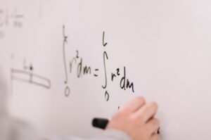 mathematical writing on whiteboard